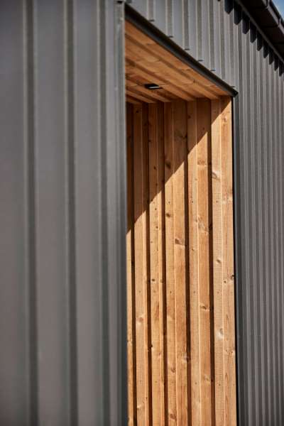 Tilbygning i stål og træ skaber ekstra plads til ”udlån” på Risskov Bibliotek, Risskov Bibliotek - Fortebakken 1, 8240 Risskov